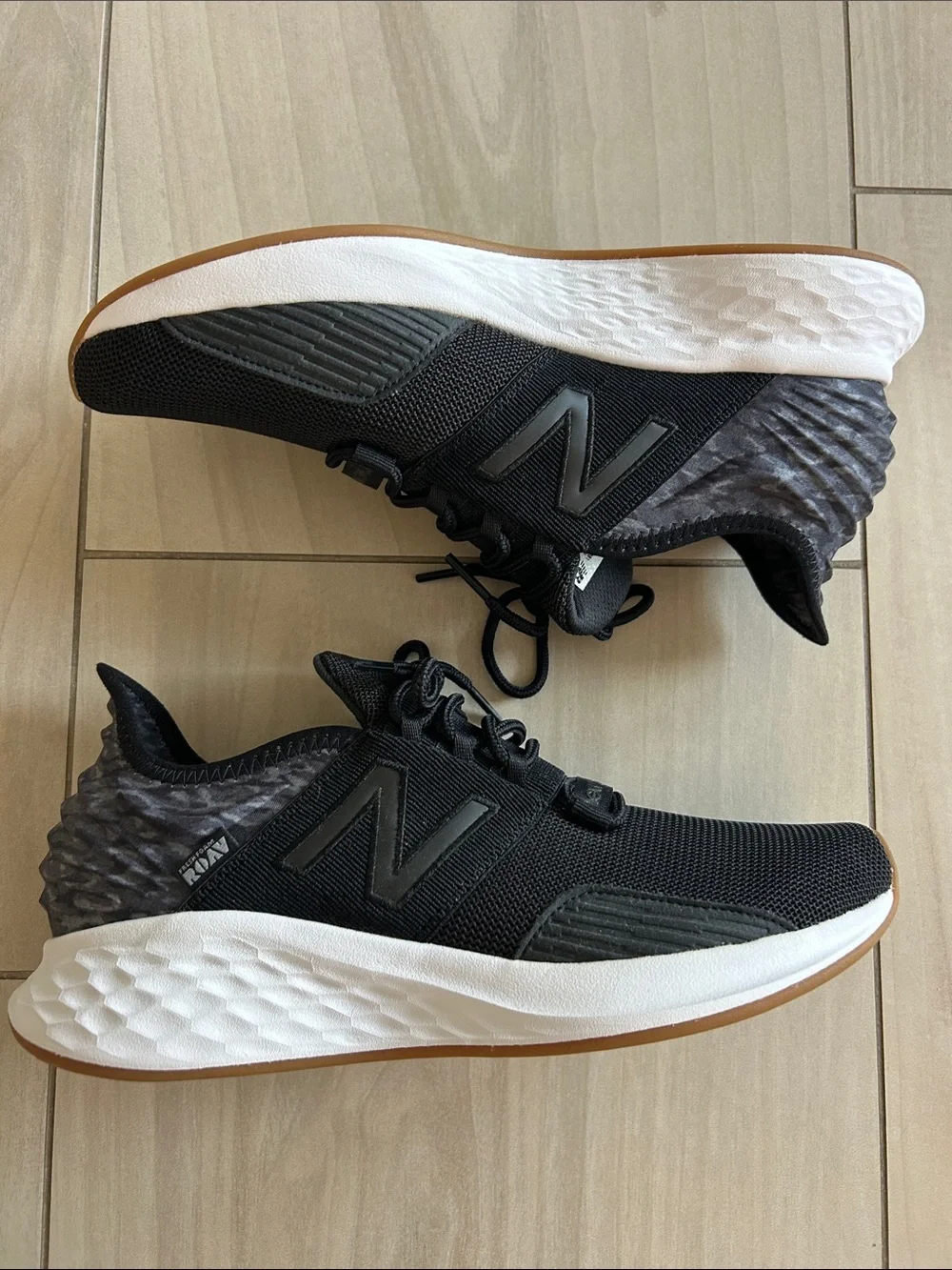 New Balance Men's Black and White Athletic Sneakers with Gum Outsole